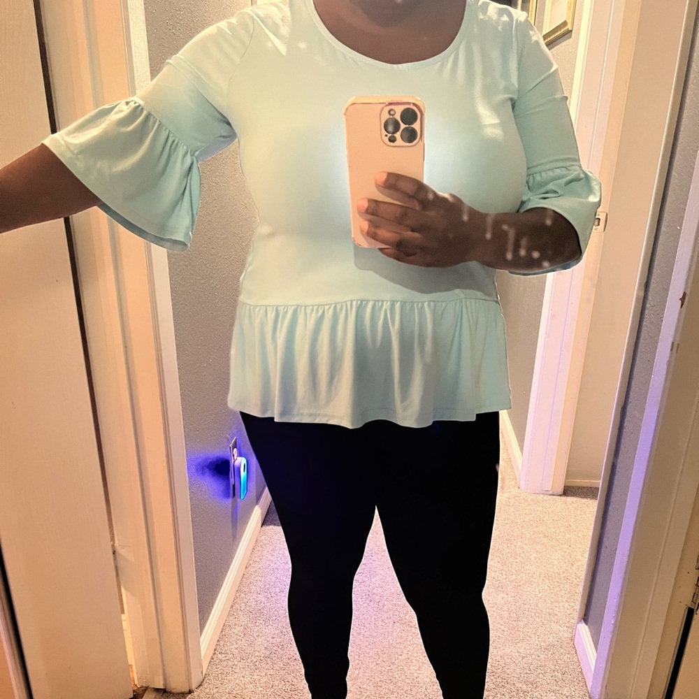 Peplum High-low shirt! Perfect for work or a brunch out with friends!